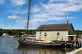 Emma C. Berry two masted schooner in front of Thomas Oyster House from Connecticut at Mystic Seaport. Mystic, CT.