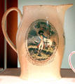 Success to America whose Militia is better than Standing Armies - May its Citizens Emulate Soldiers and is Soldiers Heroes commemorative creamware pitcher from Liverpool, England at Mattatuck Museum. Waterbury, CT.