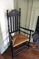 Caned armchair with heart cutout on back at Judson House. Stratford, CT.