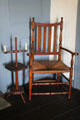 Caned armchair with adjustable-height candle stand at Judson House. Stratford, CT.