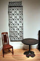 Ironwork grill from Chicago Stock Exchange by Dankmar Adler and Louis Sullivan; side chair from Blacker House in Pasadena, CA by Greene & Greene; & Lotus Table from Gables of Lake Minnetonka by John Scott Bradstreet at Yale University Art Gallery. New Haven, CT.