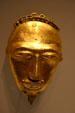 Gold pendant of African face from Ivory Coast in National Museum of African Art. Washington, DC.