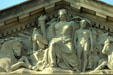 Pediment of woman with torch on EPA Building. Washington, DC.