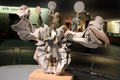 Memories: An Ancient Past whale skull sculpture shows drum dancers & spirits by Abraham Anghik Ruben at National Museum of the American Indian. Washington, DC.