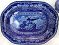 Blue flow plate with seal of Pennsylvania by English potter Thomas Mayer at National Museum of American History. Washington, DC.