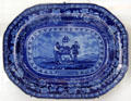 Blue flow plate with seal of Delaware by English potter Thomas Mayer at National Museum of American History. Washington, DC.