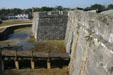 Dry moat of Castillo de San Marcos. Wet moat not required to protect against tunneling sappers because water table is naturally high. St Augustine, FL.