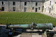 Antique cannon in courtyard of Castillo de San Marcos. St Augustine, FL.