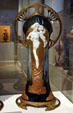 French porcelain Art Nouveau vase with Ormolu mounts showing woman & cupid by Charles Korschmann at Lightner Museum. St Augustine, FL.