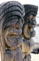 Tikis survey sea in Puuhonua O Honaunau National Historical Park. Big Island of Hawaii, HI.