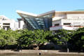 Covered arcade of Hawaii Convention Center meets Ala Wai Canal. Honolulu, HI.