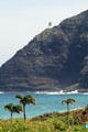 Makapu'u Lighthouse sits atop cliffs seen from Sea Life Park. HI.