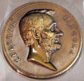 Bronze Lincoln medallion with dates of inaugurations & assassinations on back by U.S. Mint at Union Pacific Railroad Museum. Council Bluffs, IA.