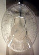 Pressed glass plate of Teddy Roosevelt surrounded by teddy bears at Historical Museum of Iowa. Des Moines, IA.