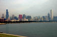 Skyline of Chicago across Lake Michigan bracketed by black Sears & white Aon Center Towers. Chicago, IL.