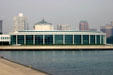 Curved glass wall of Shedd Aquarium performance area. Chicago, IL.