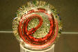 Red glass snake paperweight at Illinois State Museum. Springfield, IL.