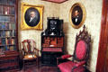 Fold down desk with portraits of Harrison & Lincoln in Library at Benjamin Harrison Presidential Site. Indianapolis, IN.
