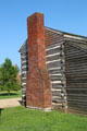 Brick chimney on log cabin visitor center. Vincennes, IN.