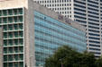 New Orleans City Hall with 1515 Poydras by Skidmore, Owings & Merrill LLP beyond. New Orleans, LA.