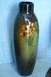 Earthenware vase in Nasturtium design by J.B. Owens Pottery of Zanesville, Ohio at New Orleans Museum of Art. New Orleans, LA.