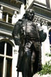Statue of Ben Franklin outside of Old City Hall on site of first American Public School which Franklin attended. Boston, MA.