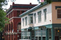 Palmer St. streetscape with brick arcaded former fire station. Lowell, MA.