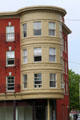 Round corner turret on residential building. Lowell, MA.