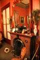 Red parlor fireplace at Fall River Historical Society Museum. Fall River, MA.