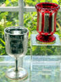 Silvered glass engraved goblet and spill holder at Sandwich Glass Museum. Sandwich, MA.
