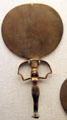 Ancient Egyptian bronze caryatid mirror from Sudan Taharqa Temple at Museum of Fine Arts. Boston, MA.