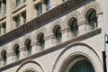 Romanesque Revival arches of Ames Building. Boston, MA.