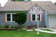 Stucco bungalow at 25 Clark Ave. in Moss Mansion heritage district. Billings, MT.