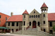 Parmly Billings Public Library with J.K. Ralston log cabin. Billings, MT.