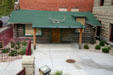 Western artist J.K. Ralston log cabin moved to Parmly Billings Public Library. Billings, MT.
