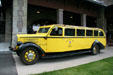 White Bus of Yellowstone Park Company, once used to take visitors to park at Museum of the Yellowstone. West Yellowstone, MT