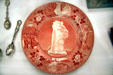 Antique souvenir Yellowstone Park plate with Old Faithful at Museum of the Yellowstone. West Yellowstone, MT