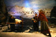 Diorama of Mormon push cart settlers being rescued from winter snows at Kearney Arch. Kearney, NE.