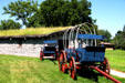 Covered wagons & sod roofed hut at Fort Kearney State Historical Park. Kearney, NE