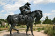 Statue of cowboy Trail Boss by Robert Summers on Boot Hill Cemetery. Ogallala, NE