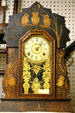 Shelf clock with carved owls by Wm. L. Gilbert Clock Co., Winsted, Conn. at Lincoln County Historical Museum. North Platte, NE.