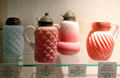 Glass utility vessels made in OH by firms Consolidated Lamp & Glass; Beaumont Glass; Buckeye Glass; Model Flint Glass at Museum of American Glass. Milville, NJ.