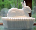 Pressed milk glass mule-eared rabbit covered dish by Westmoreland Co. of Grapeville, PA at Museum of American Glass. Milville, NJ.