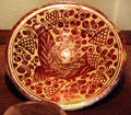 Spanish lusterware majolica plate with painted bird at New Mexico History Museum. Santa Fe, NM.