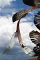 Feather detail of Apache Mountain Spirit Dancer sculpture by Craig Dan Goseyun at Museum of Indian Arts & Culture. Santa Fe, NM.