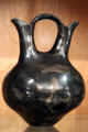 Stone polished native black wedding jar from Ohkay Owingeh, NM at Maxwell Museum of Anthropology. Albuquerque, NM.