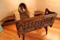 Bench before corner fireplace by Nicolai Fechin at Taos Art Museum. Taos, NM.