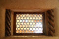 Artistic window between rooms at Taos Art Museum. Taos, NM.