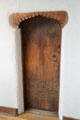 Carved door in Nicolai Fechin studio at Taos Art Museum. Taos, NM.