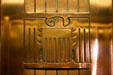 Brass American Eagle shield decorates elevator of Hoover Dam. Las Vegas, NV.